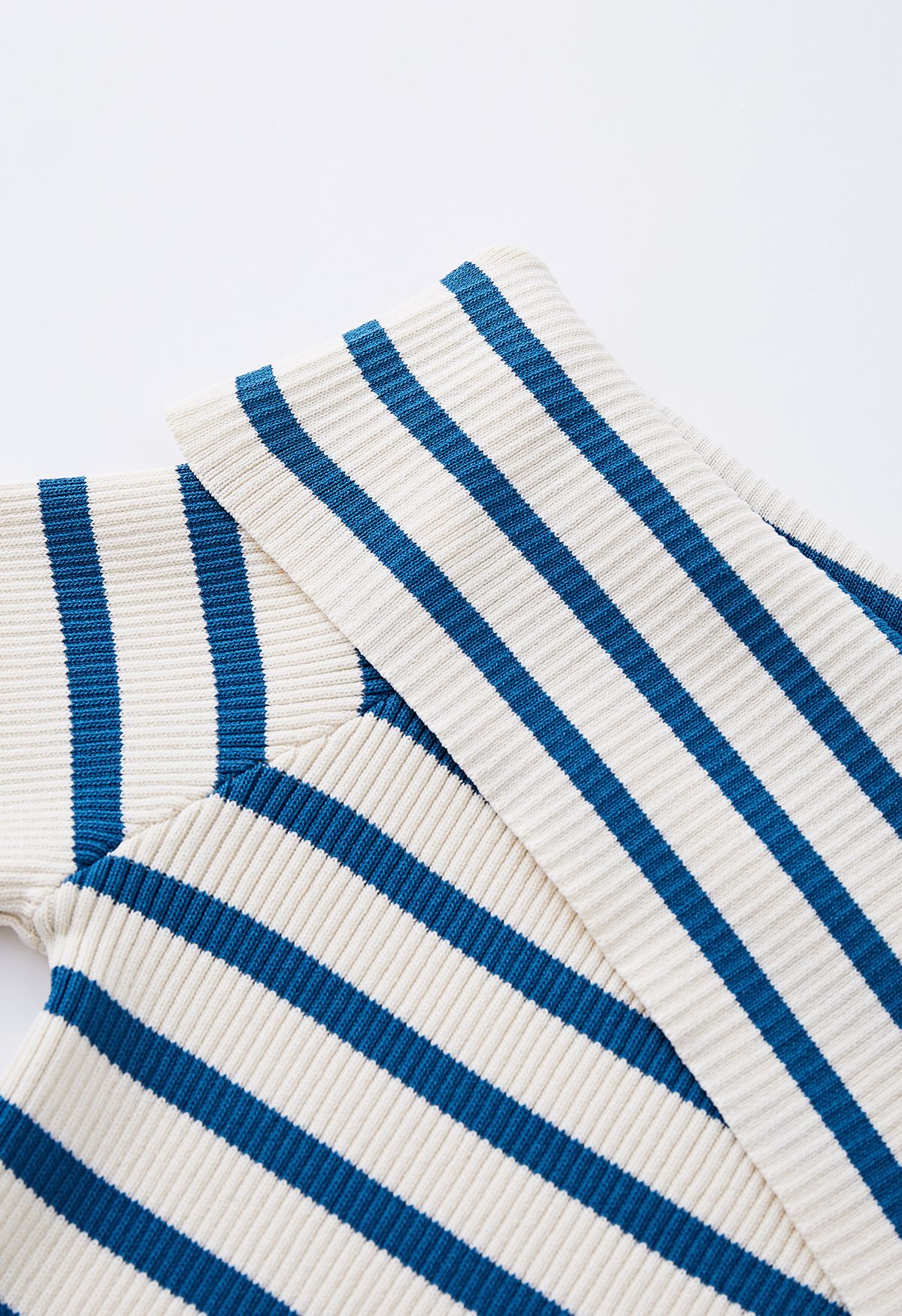 Folded Off-Shoulder Striped Knit Top in Blue