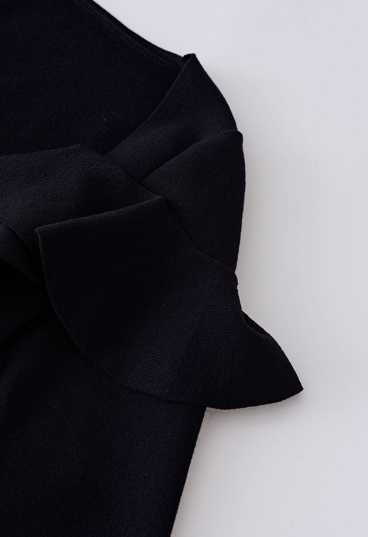 Sassy Wide Ruffled Neckline Knit Top in Black