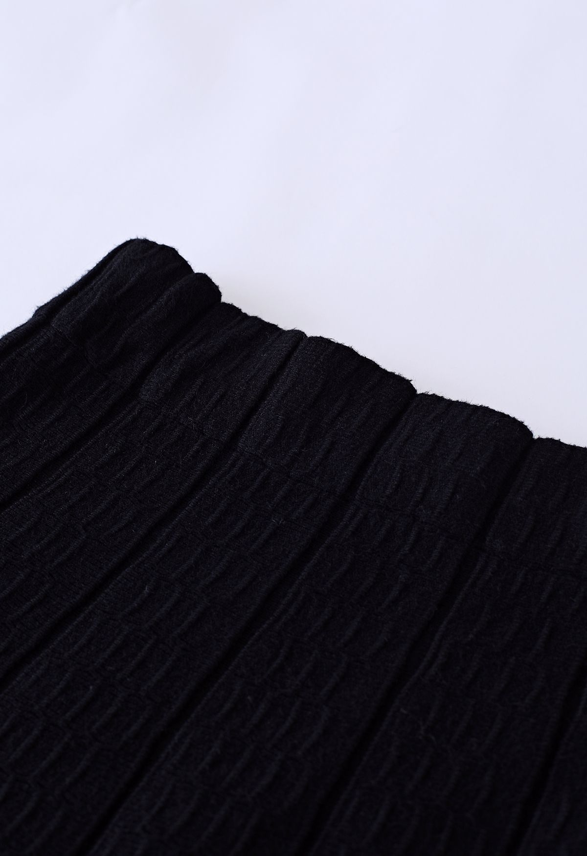 Embossed Texture Soft Knit Frilling Skirt in Black