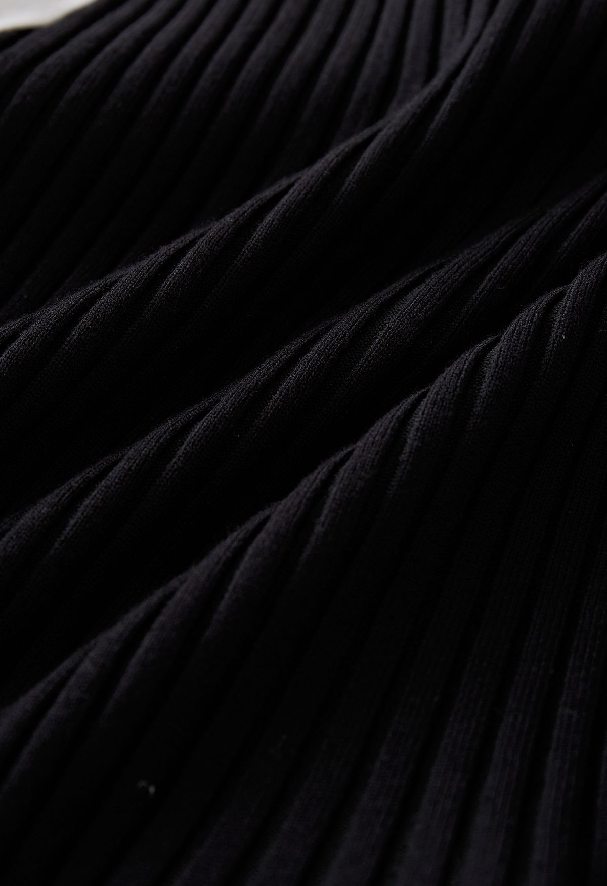 Asymmetric Ribbed Knit Spliced Shirt in Black