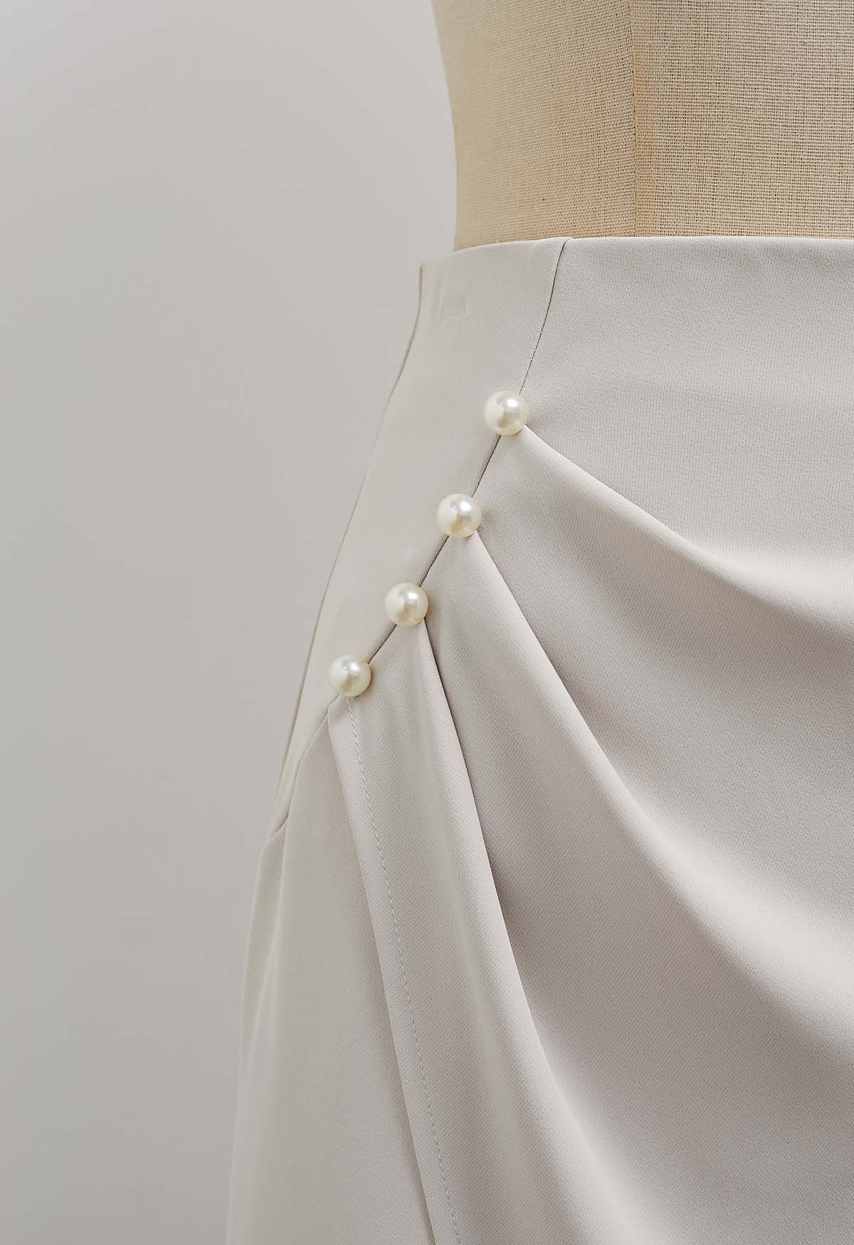 Pearl Side Pleats Asymmetric Flap Midi Skirt in Ivory