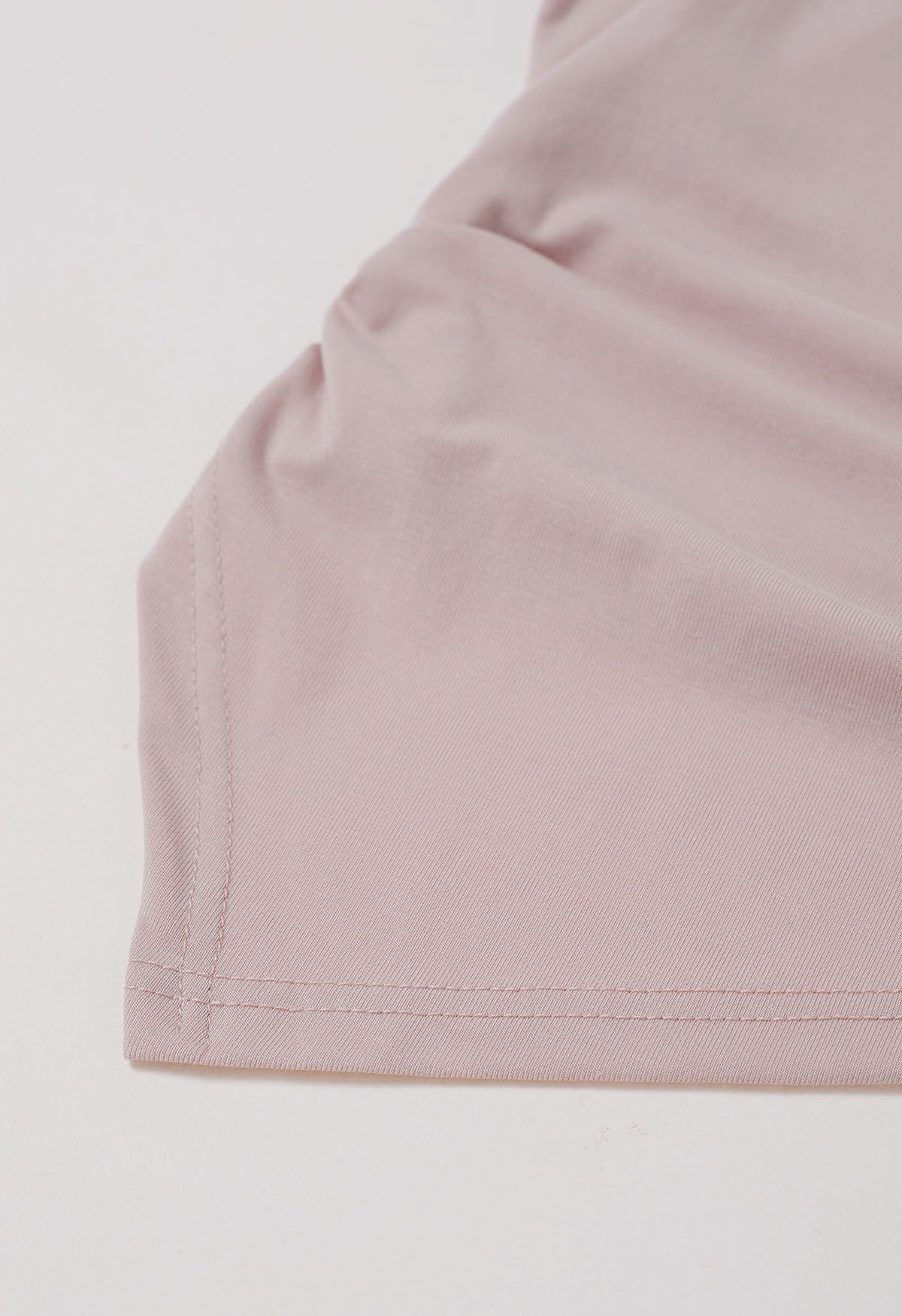 Faux-Wrap Short Sleeve Asymmetric Top in Dusty Pink