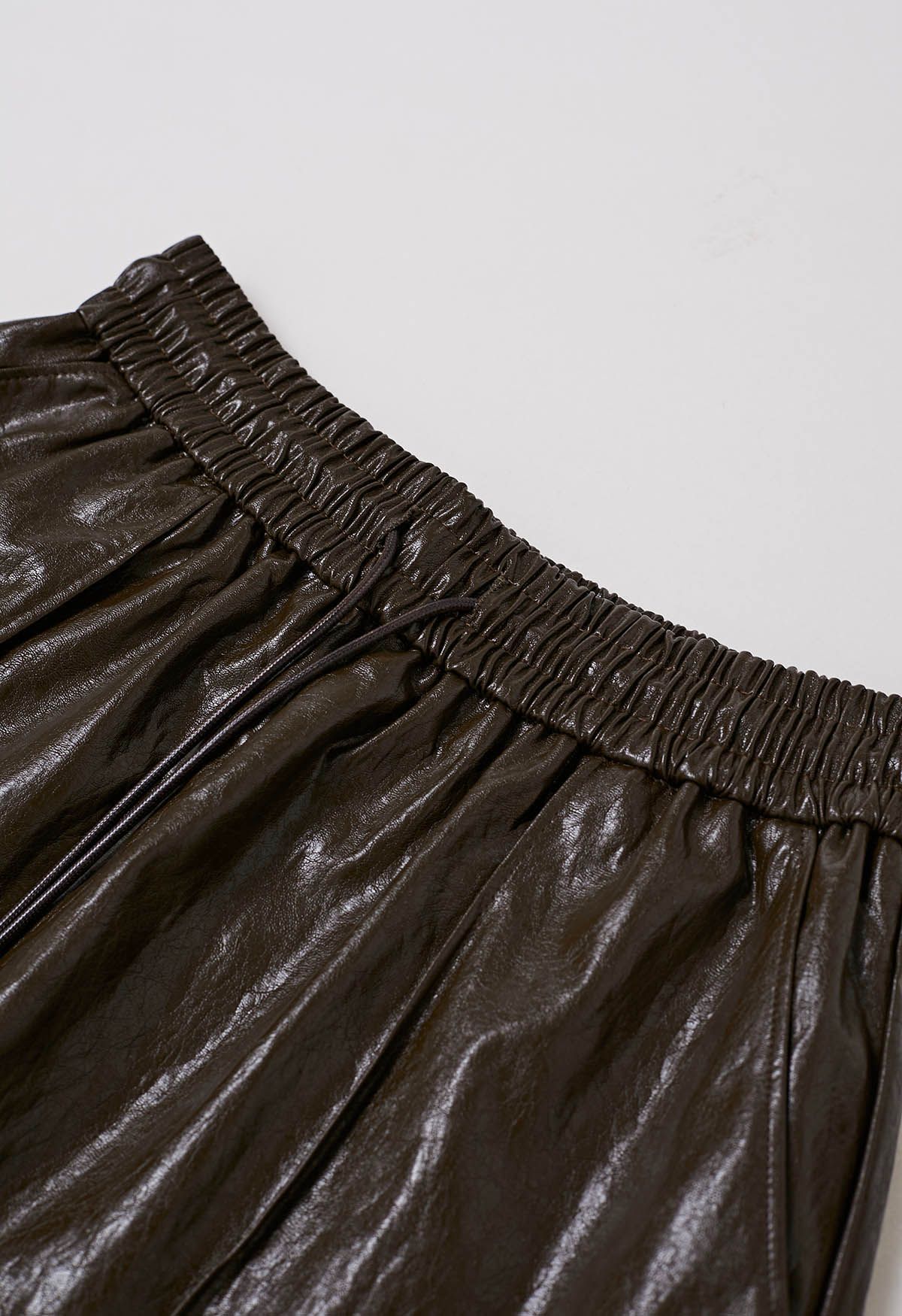 Urban Chic Faux Leather Drawstring Shorts in Chocolate