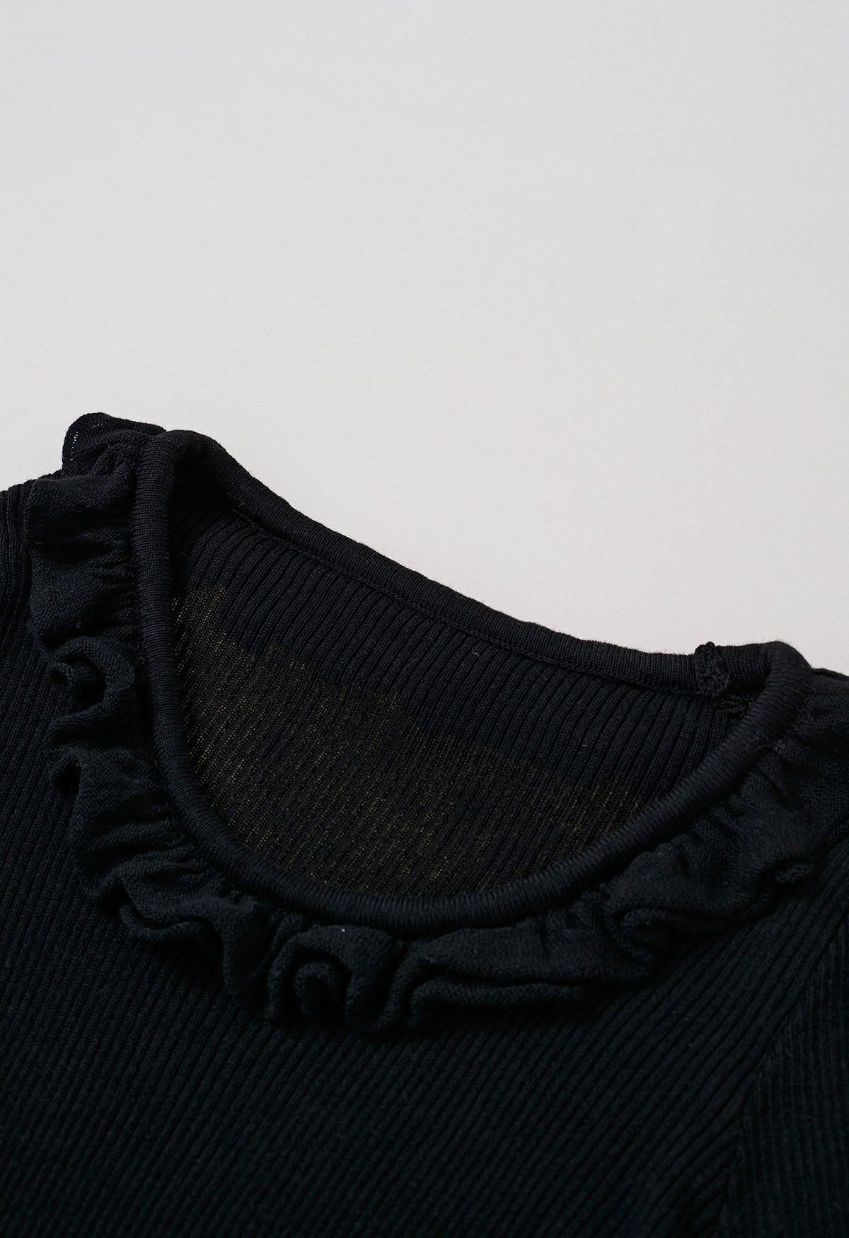 Ruffled Charm Long-Sleeve Ribbed Knit Top in Black