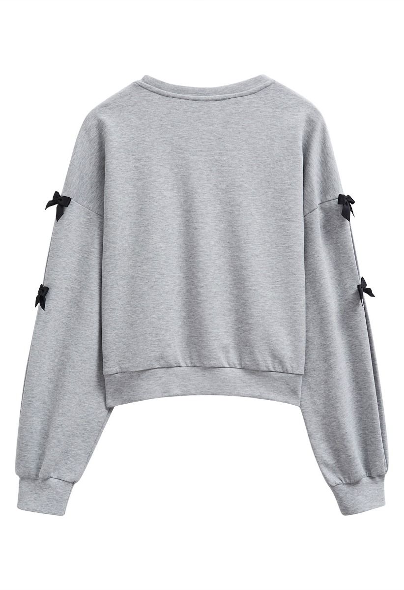 Bowknot Adorned Sleeve Cropped Sweatshirt in Grey