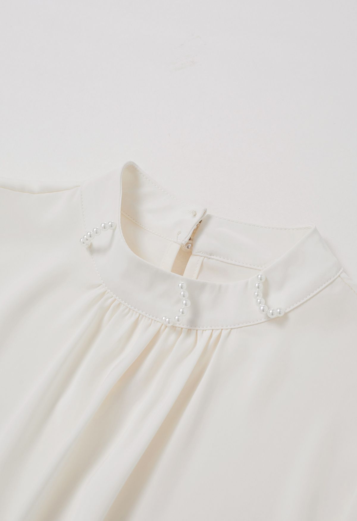 Pearl Neckline Side Bowknot Satin Top in Cream