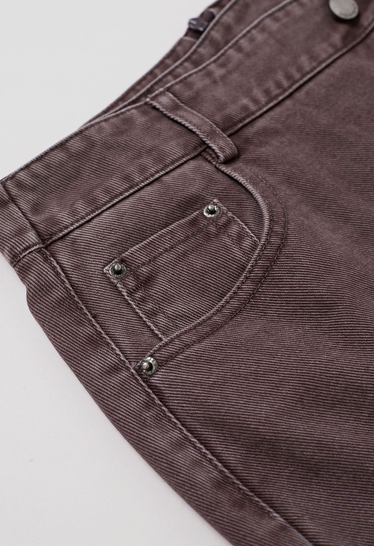 Double-Buttoned Flap Denim Mini Skirt in Plum