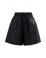 Urban Chic Faux Leather Drawstring Shorts in Black