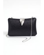 Solid Textured Leaf Clutch in Black